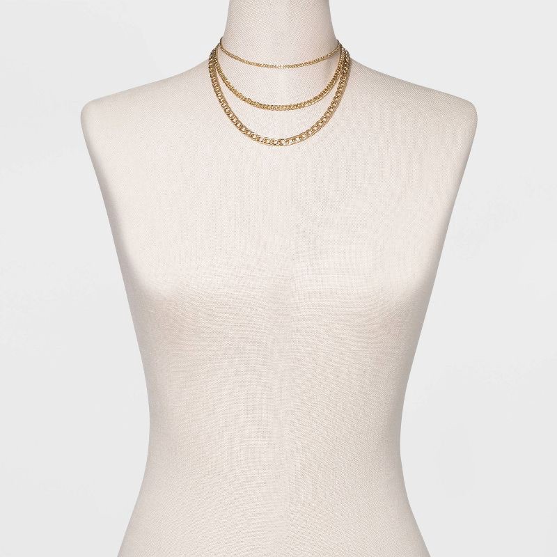 slide 2 of 3, 16" Layered Curb Chain Necklace - A New Day™ Gold: Nickel-Free Metal, Lobster Claw Clasp, 15" Length, 1 ct