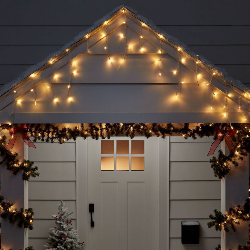 slide 2 of 5, 70ct LED Christmas Icicle Lights Warm White with White Wire - Wondershop™, 70 ct