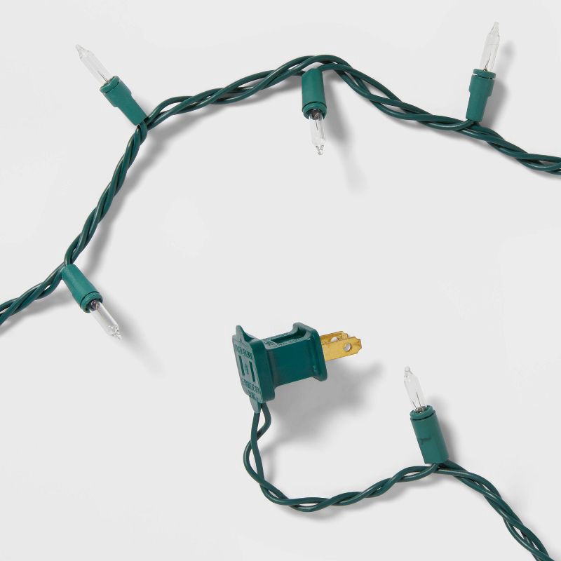 slide 5 of 5, 100ct Incandescent Smooth Mini Christmas String Lights Clear with Green Wire - Wondershop™, 100 ct