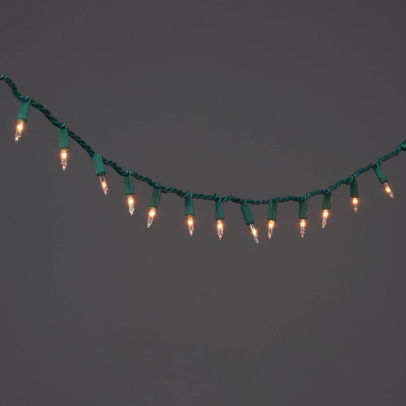 slide 1 of 5, 100ct Incandescent Smooth Mini Christmas String Lights Clear with Green Wire - Wondershop™, 100 ct