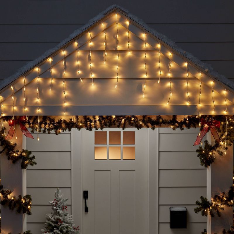 slide 2 of 5, 175ct Christmas Warm White LED Icicle Lights with White Wire and Spool - Wondershop™, 175 ct