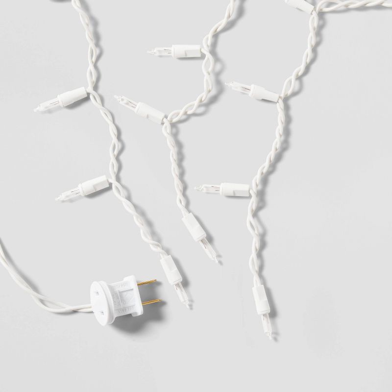 slide 5 of 5, 175ct Christmas Warm White LED Icicle Lights with White Wire and Spool - Wondershop™, 175 ct