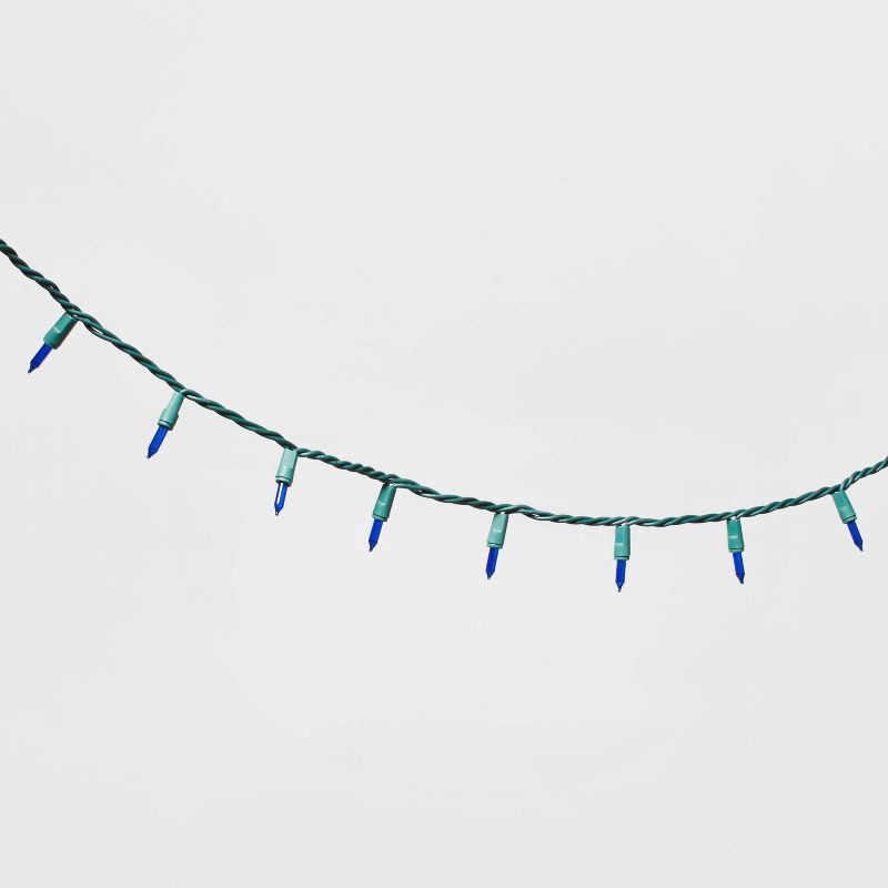 slide 3 of 5, 100ct Incandescent Smooth Mini Christmas String Lights Blue with Green Wire - Wondershop™, 100 ct