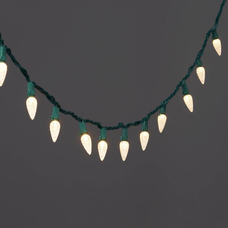 slide 1 of 5, 60ct LED C6 Faceted Christmas String Lights Warm White with Green Wire - Wondershop™, 60 ct