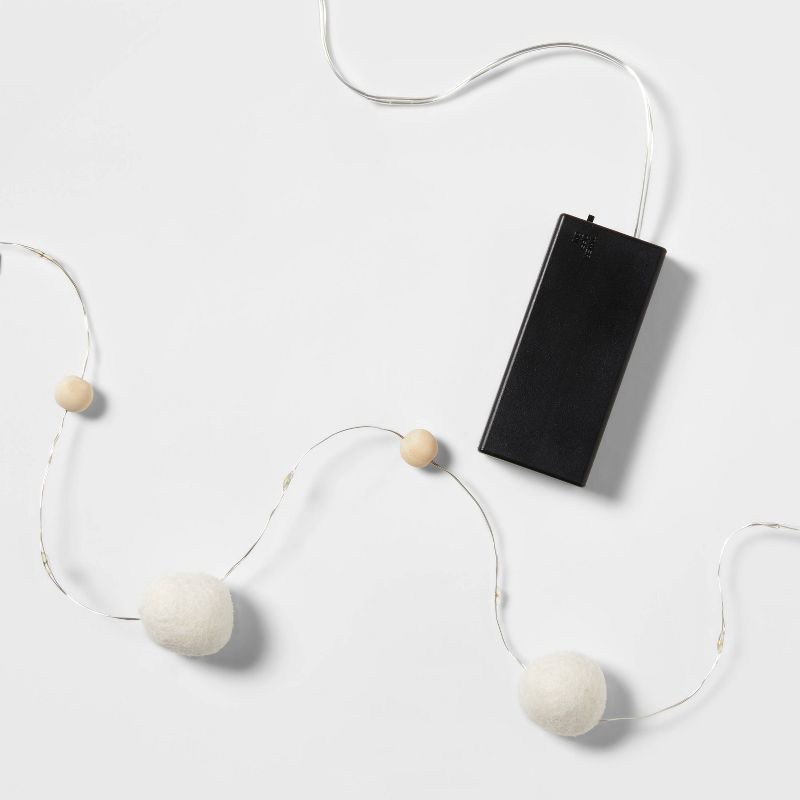 slide 2 of 4, 9.6' 30ct Battery Operated LED Felted Wool and Wood Christmas Dewdrop Fairy String Lights Warm White with Silver Wire - Wondershop, 30 ct