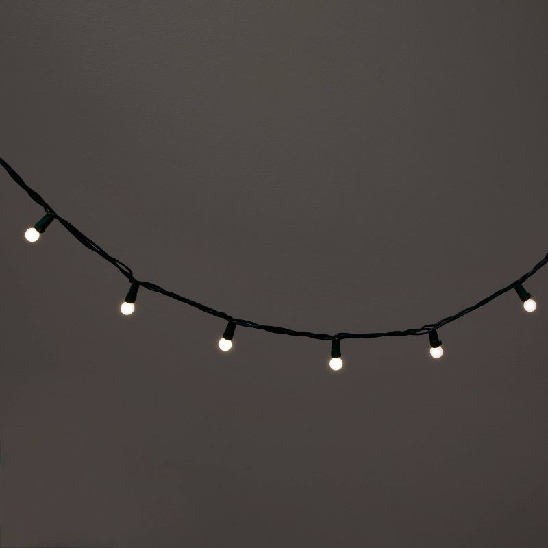 slide 1 of 5, 50ct LED Smooth Sphere Christmas String Lights Warm White with Green Wire - Wondershop™, 50 ct