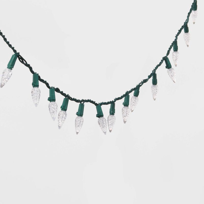 slide 3 of 5, 60ct LED C6 Faceted Christmas String Lights Cool White with Green Wire - Wondershop™: Indoor/Outdoor, UL Listed, Connectable, 60 ct