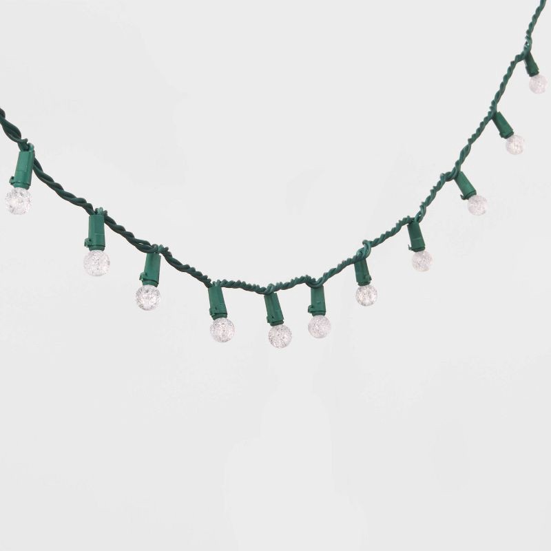 slide 3 of 5, 150ct LED Faceted Sphere Christmas String Lights Spool Warm White with Green Wire - Wondershop™: Indoor/Outdoor Holiday Decor, 150 ct