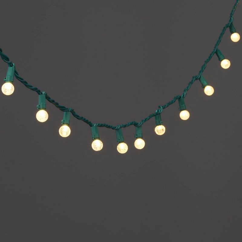 slide 1 of 5, 150ct LED Faceted Sphere Christmas String Lights Spool Warm White with Green Wire - Wondershop™: Indoor/Outdoor Holiday Decor, 150 ct