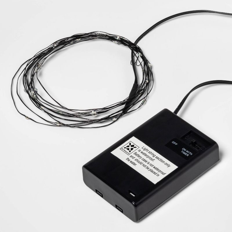 slide 5 of 5, 30ct LED Halloween Dewdrop Fairy String Lights Purple - Hyde & EEK! Boutique™: Battery-Operated, Indoor Use, 30 ct