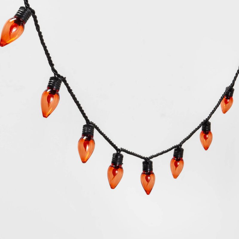 slide 3 of 5, 20ct LED Halloween String Lights Orange Flicker - Hyde & EEK! Boutique™: Twinkling C7 Bulbs, Indoor/Outdoor Use, 20 ct