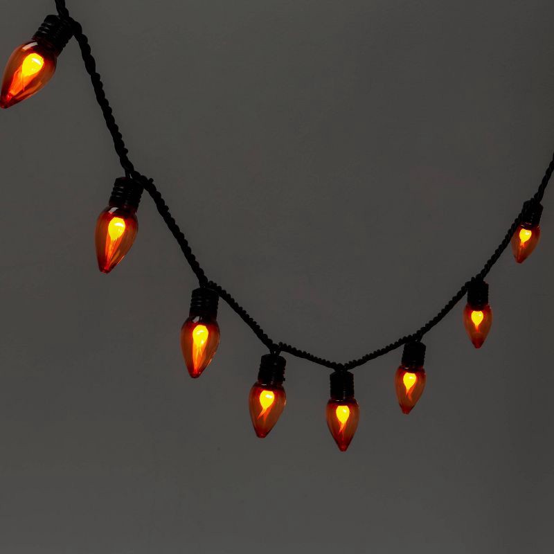 slide 1 of 5, 20ct LED Halloween String Lights Orange Flicker - Hyde & EEK! Boutique™: Twinkling C7 Bulbs, Indoor/Outdoor Use, 20 ct