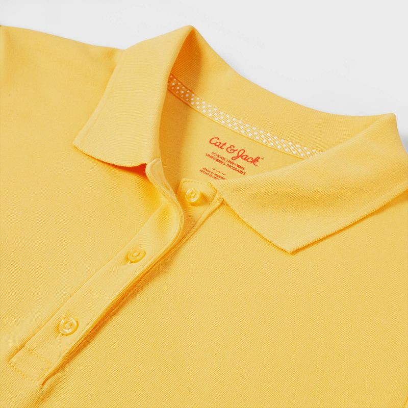 slide 3 of 3, Girls' Short Sleeve Interlock Uniform Polo Shirt - Cat & Jack™ Yellow L, 1 ct