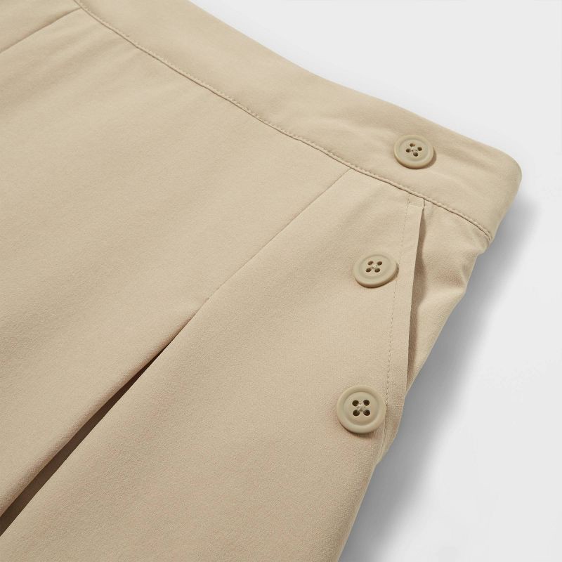 slide 3 of 3, Girls' Woven Performance Pleated Uniform Skort - Cat & Jack™ Khaki M, 1 ct