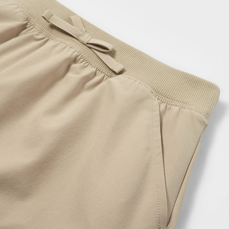 slide 3 of 3, Girls' Woven Performance Uniform Skort - Cat & Jack™ Khaki XS: Recycled Polyester, Spandex, Elastic Waistband, Built-in Shorts, 1 ct