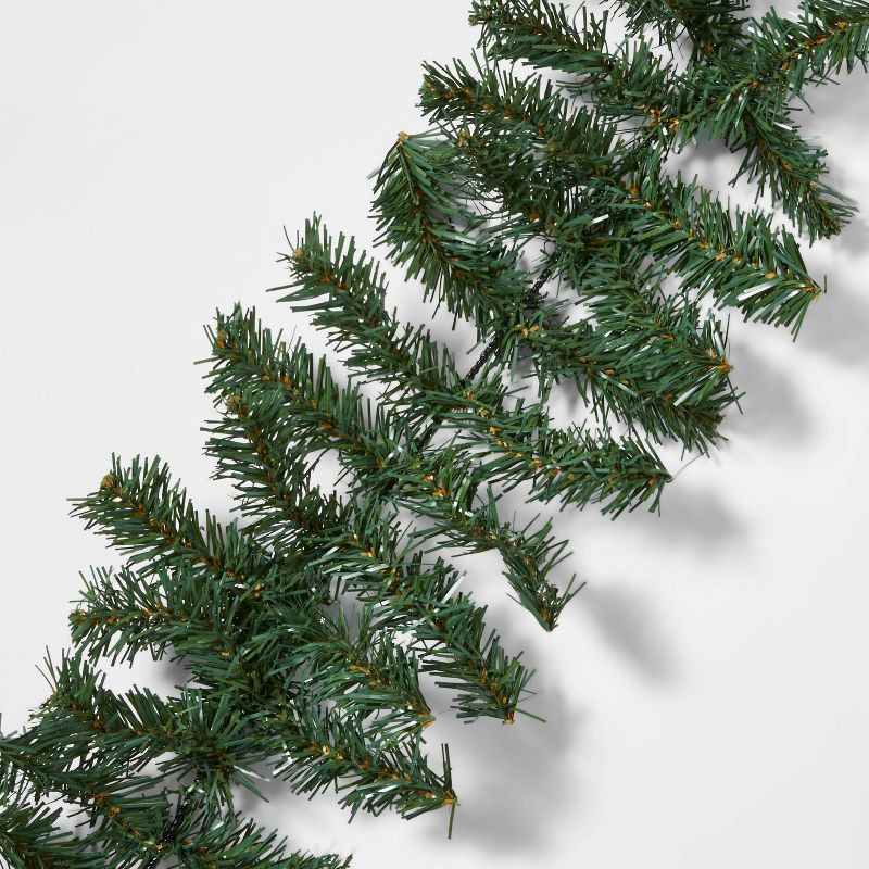 slide 3 of 3, 9' Unlit Artificial Pine Christmas Garland Green - Wondershop™: Faux Floral, Indoor/Sheltered Outdoor Use, Wall/Door Decor, 1 ct