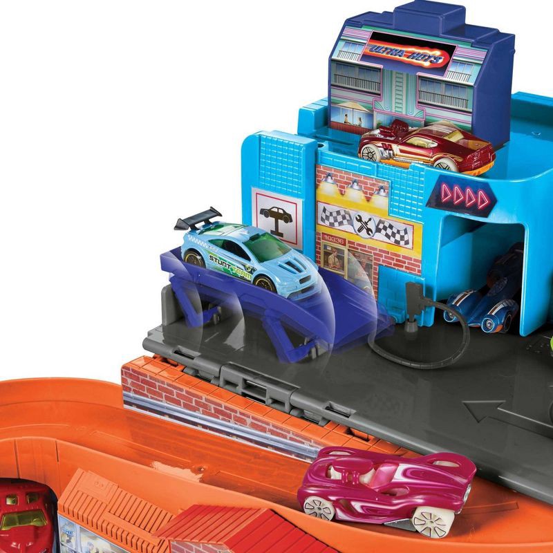 slide 3 of 6, Hot Wheels Ultra Hots Sto & Go Track Set - 6 Piece + Flying Customs Retro Playset with 5 Die-Cast Cars, 6 ct