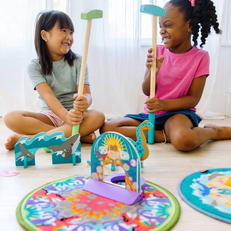 slide 4 of 9, Melissa & Doug Fun at the Fair! Mini Golf Play Set - 3 Multi-Themed Holes and Wooden Obstacles, 1 ct