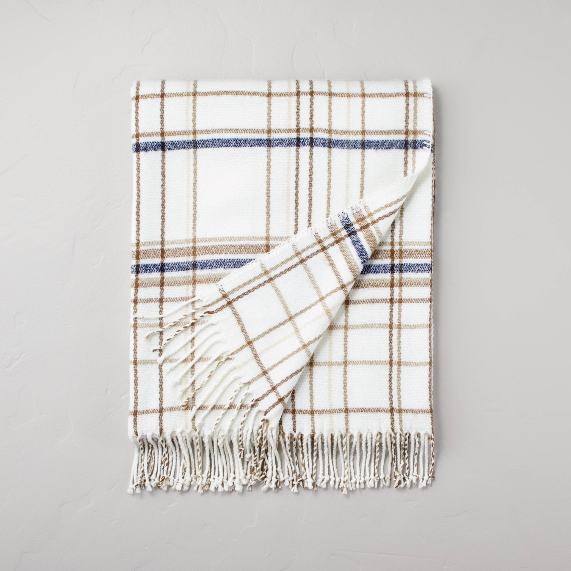 slide 1 of 4, Thin Stripe Plaid with Twisted Fringe Throw Blanket Cream/Navy/Brown - Hearth & Hand with Magnolia, 1 ct