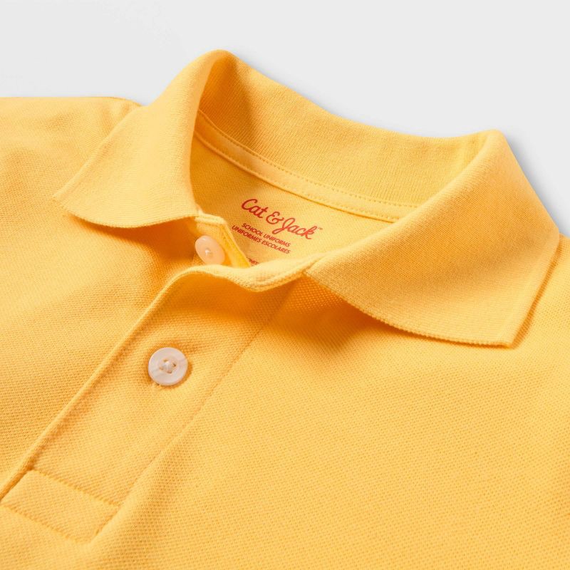 slide 3 of 3, Boys' Short Sleeve Pique Uniform Polo Shirt - Cat & Jack™ Yellow M, 1 ct