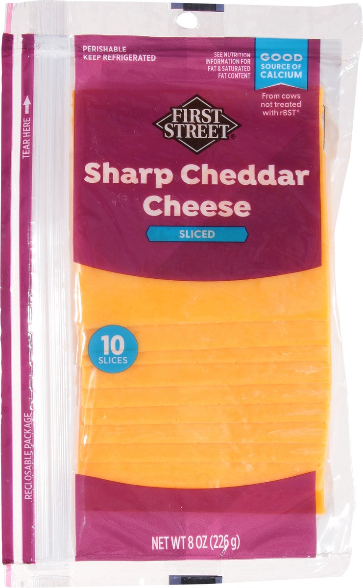 slide 6 of 14, First Street Sharp Cheddar Sliced, 8 oz