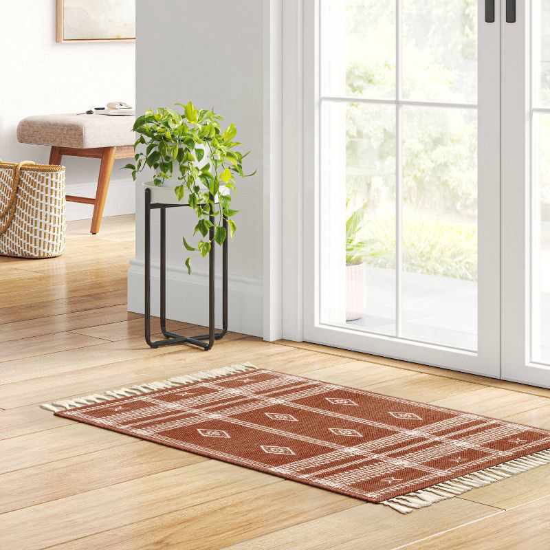 slide 2 of 4, 2'3"x3'9" Washable Southwest Plaid Accent Rug Rust - Threshold™, 1 ct