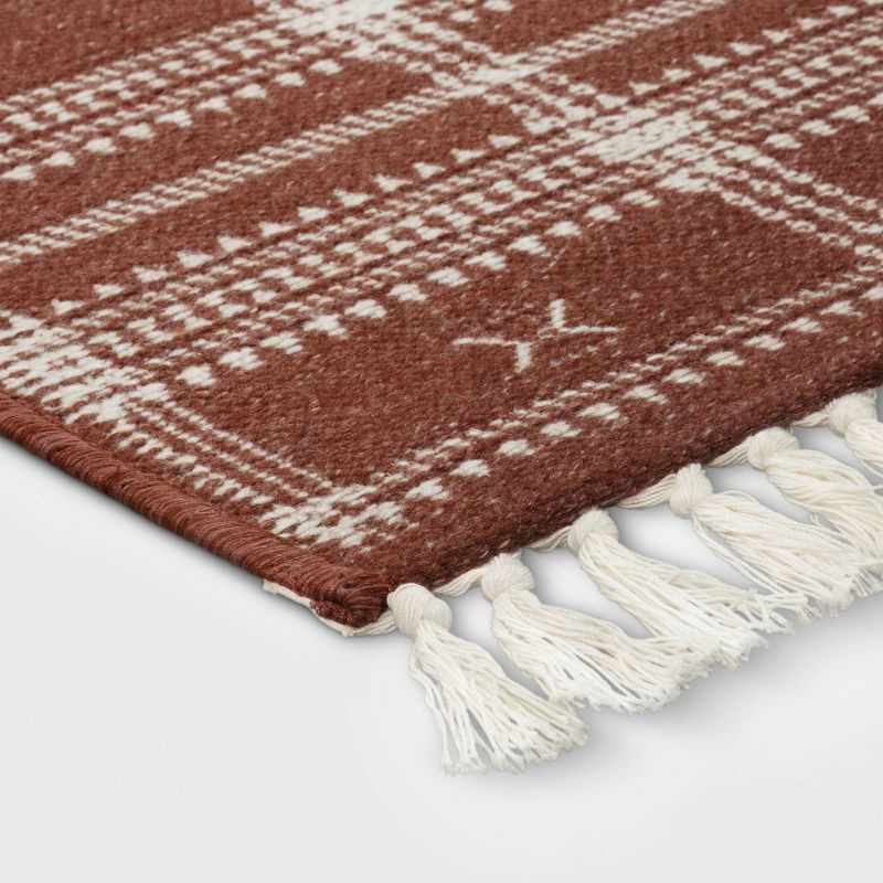 slide 3 of 4, 2'3"x3'9" Washable Southwest Plaid Accent Rug Rust - Threshold™, 1 ct