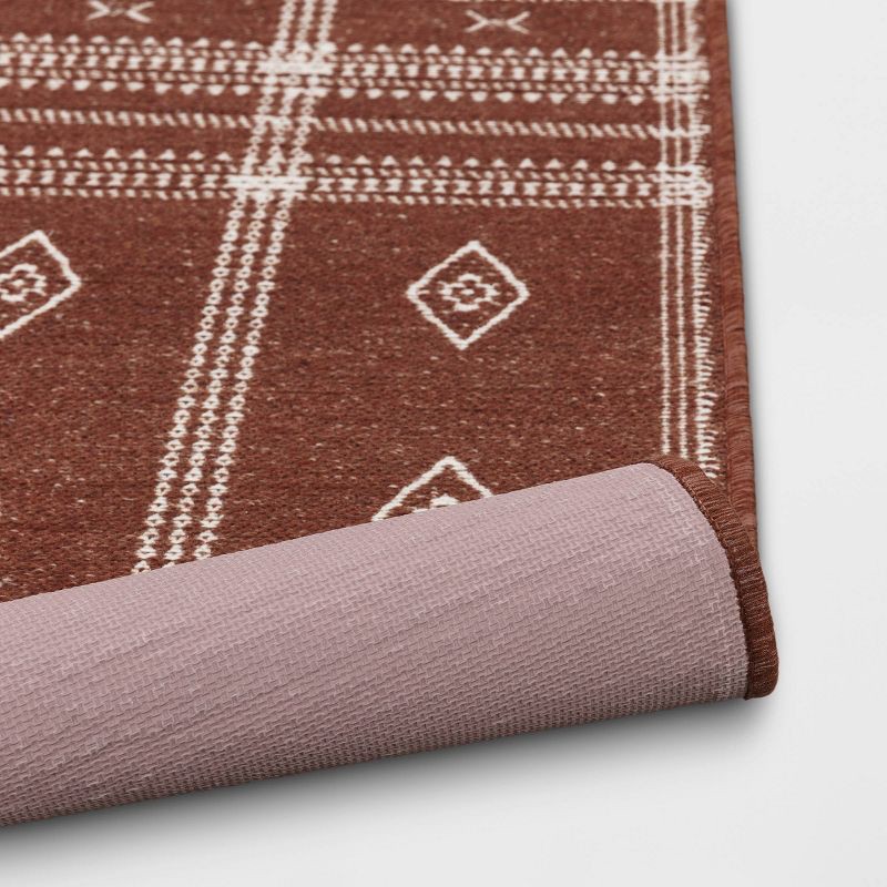 slide 4 of 4, 2'3"x3'9" Washable Southwest Plaid Accent Rug Rust - Threshold™, 1 ct