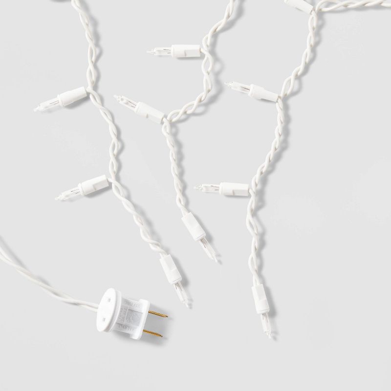 slide 5 of 5, 300ct Incandescent Mini Christmas Icicle Lights Clear Twinkle with White Wire - Wondershop™: Indoor/Outdoor Use, Electric Powered, 300 ct