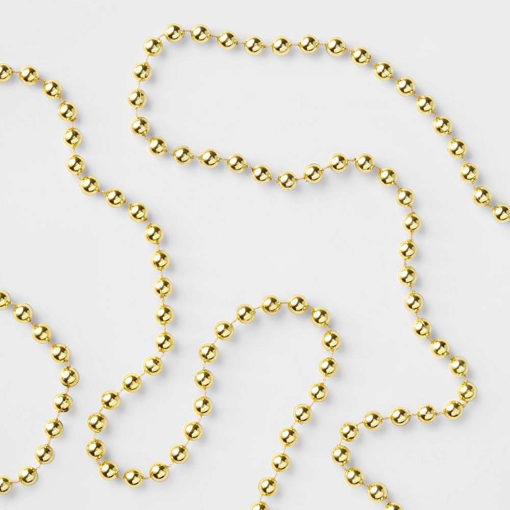 slide 2 of 2, 25' Plastic Bead Garland Gold - Wondershop, 25 ft