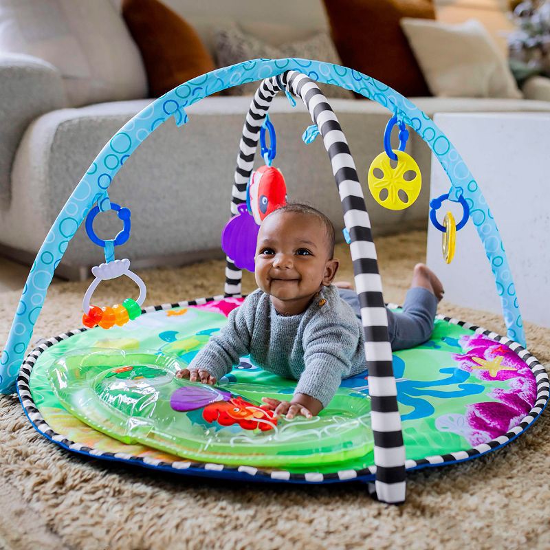 slide 7 of 19, Baby Einstein Ocean Explorers 2-in-1 Water Play Mat & Activity Gym - Sea Floor Explorers, 1 ct