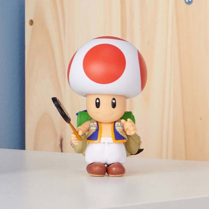 slide 2 of 5, Nintendo The Super Mario Bros. Movie Toad Figure with Frying Pan Accessory, 1 ct