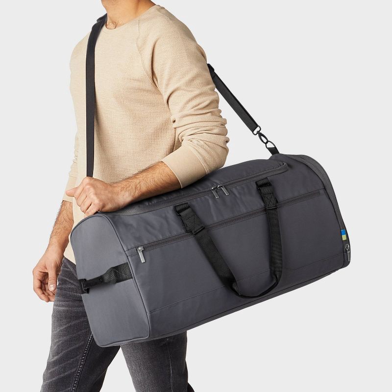 slide 2 of 4, 60L Duffel Bag Gray - Open Story™: Water-Resistant Softside Luggage, 60 liter