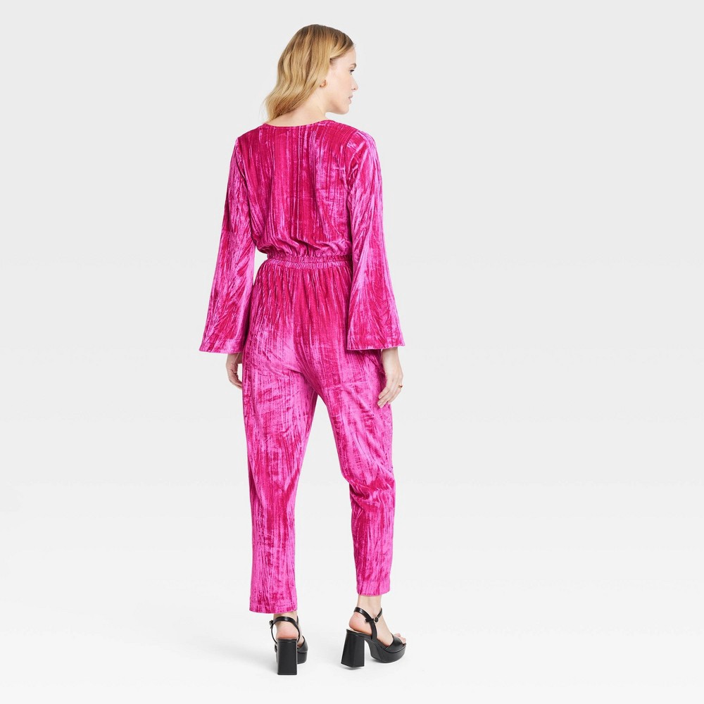 slide 2 of 3, Women's Bell Long Sleeve Velour Jumpsuit - A New Day Pink XS, 1 ct