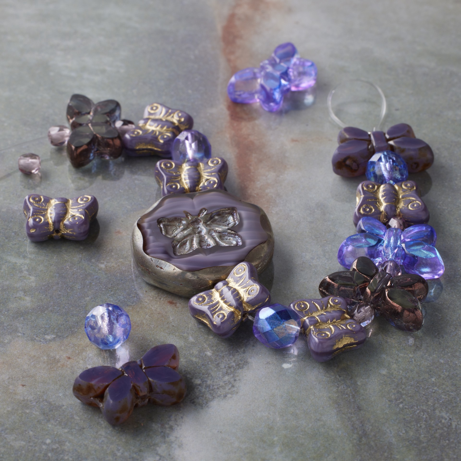 slide 4 of 5, Purple Czech Glass Butterfly Bead Mix By Bead Landing, 3.9mm-25.5mm
