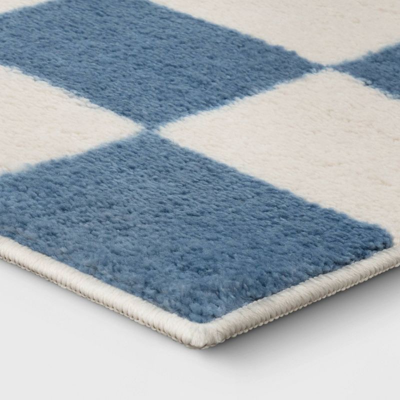 slide 3 of 4, 4'x5'5" Area Kids' Rug Checker Blue - Pillowfort™, 1 ct