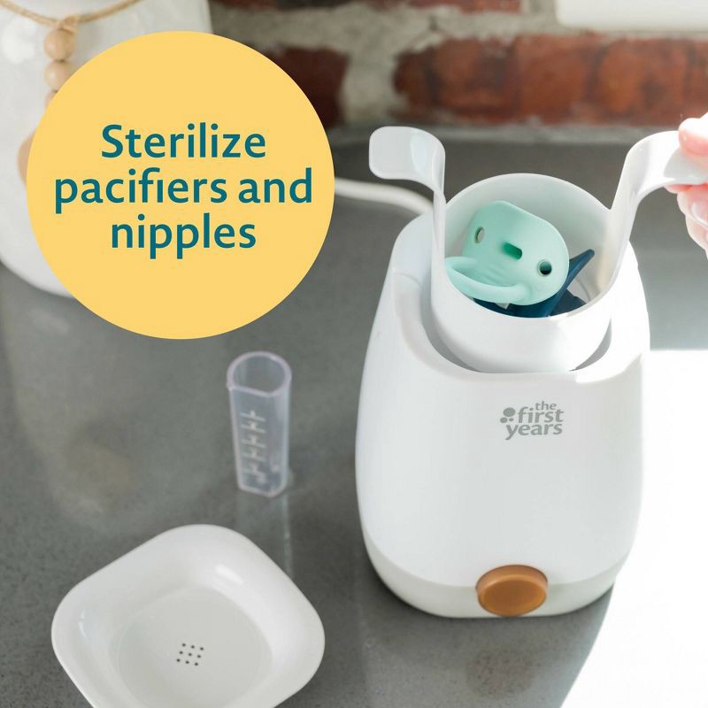 slide 3 of 9, The First Years Baby Bottle Warmer and Sterilizer - Pacifier and Bottle Nipple Sanitizer, 1 ct