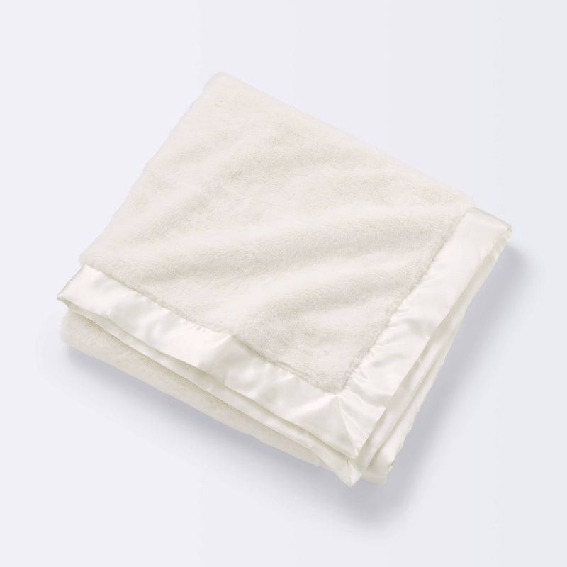 slide 1 of 4, Solid Satin Edge Plush Baby Blanket - Cream - Cloud Island™, 1 ct