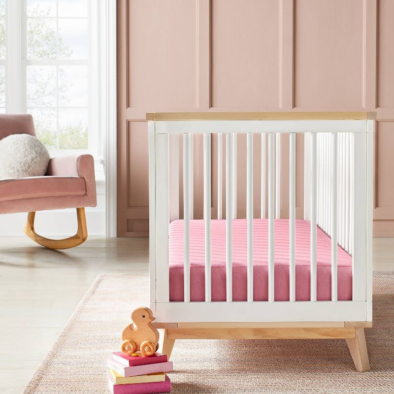 slide 4 of 4, Polyester Rayon Fitted Crib Sheet - Solid Mauve - Cloud Island™, 1 ct