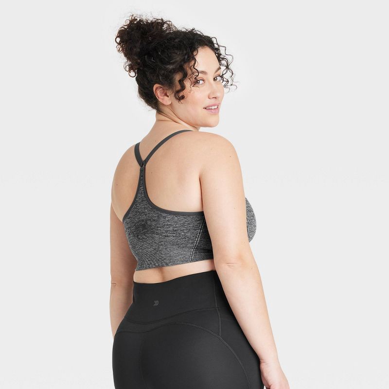 slide 4 of 6, Women's Seamless Medium Support Cami Sports Bra - All In Motion™ Heathered Black M: Racerback, Removable Padding, 1 ct