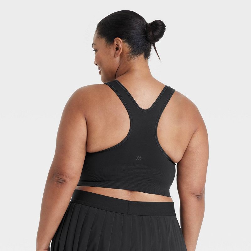 slide 2 of 7, Women's Seamless Medium Support Racerback Sports Bra - All In Motion™ Black XL: Removable Padding, Knit, 1 ct