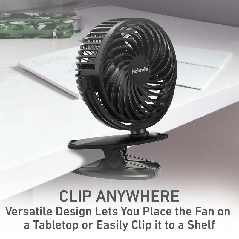 slide 2 of 8, Holmes 4" On-The-Go Portable Clip Rechargeable Battery 360° Rotation Fan Black, 1 ct