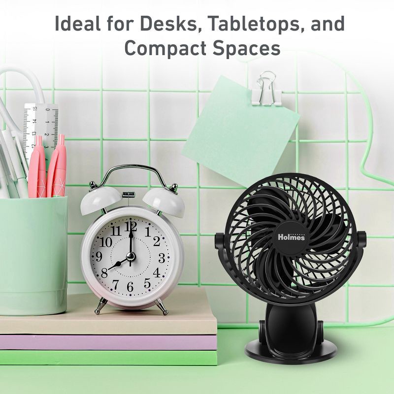 slide 5 of 8, Holmes 4" On-The-Go Portable Clip Rechargeable Battery 360° Rotation Fan Black, 1 ct