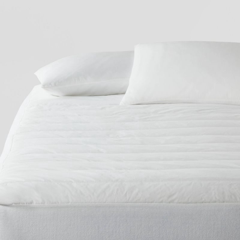 slide 3 of 3, King Performance Mattress Pad - Threshold™: Hypoallergenic, Quilted, Waterproof, OEKO-TEX Certified, 1 ct