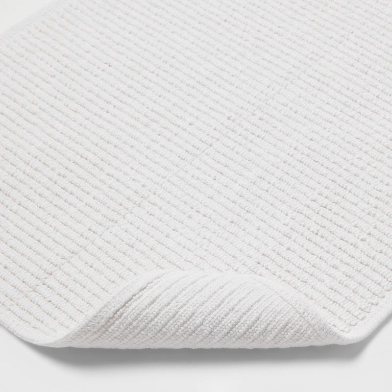 slide 3 of 3, 20"x30" Performance Plus Bath Rug Solid White - Threshold™, 1 ct