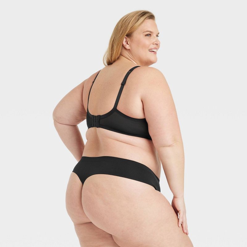 slide 3 of 3, Women's Seamless Thong Underwear - Auden™ Black 2X: Lightweight Nylon Spandex, Mid Rise, Pull-On, 1 ct