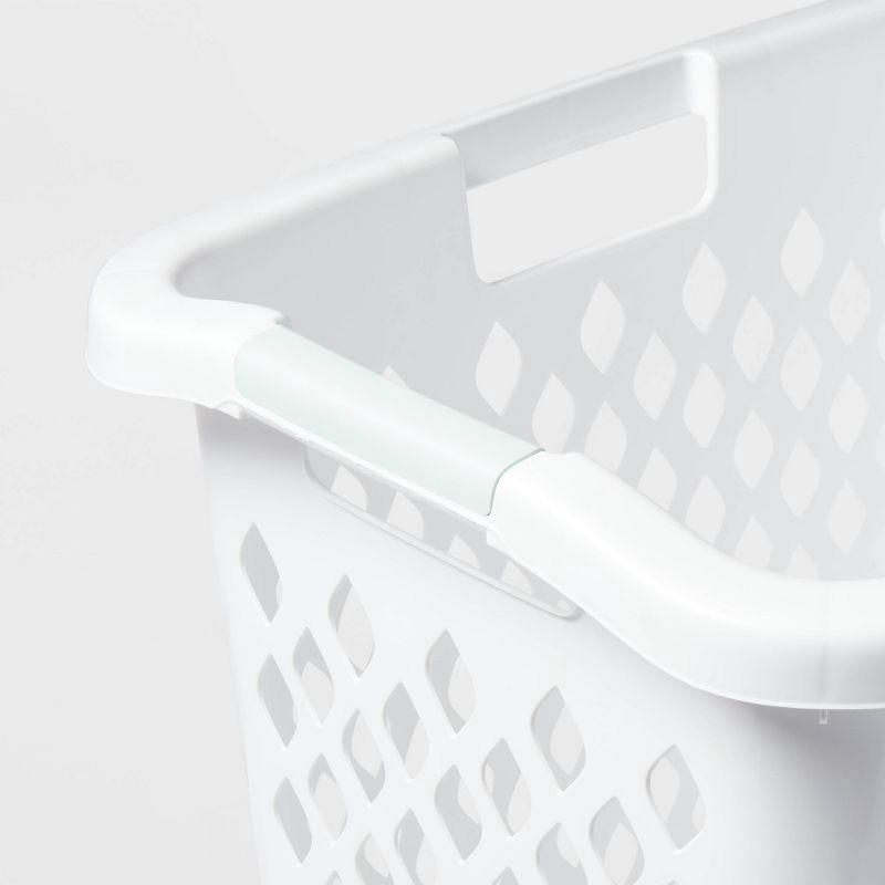 slide 3 of 3, 2.1bu Lamper White - Brightroom™: Plastic Clothes Hamper with Built-In Handles, Open-Top, 19.55 Volume Capacity, 1 ct