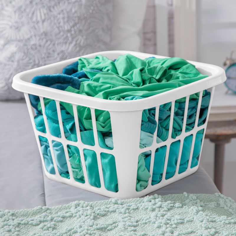 slide 3 of 6, 1.25bu Laundry Basket White - Brightroom™: Plastic Clothes Hamper with Built-In Handles, Medium Size, Portable Storage, 1 ct