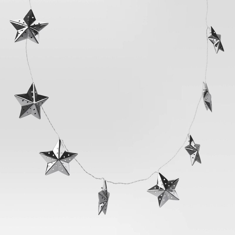 slide 3 of 5, 10ct LED Battery Operated Silver Star Christmas Novelty String Lights Warm White - Wondershop™, 10 ct