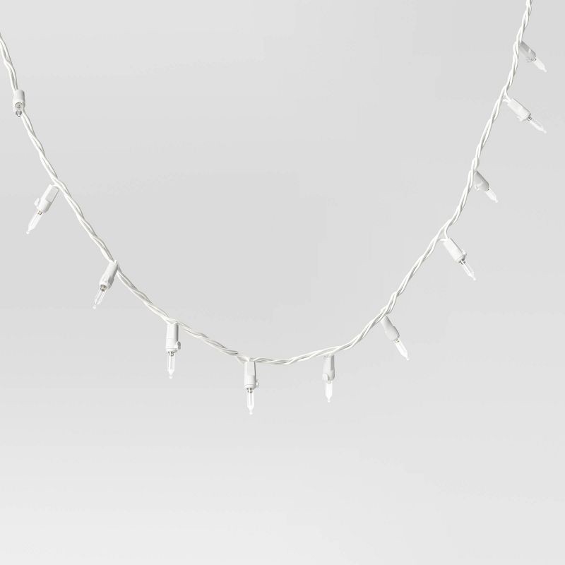 slide 3 of 4, 100ct LED Smooth Mini Christmas String Lights Warm White with White Wire - Wondershop™, 100 ct